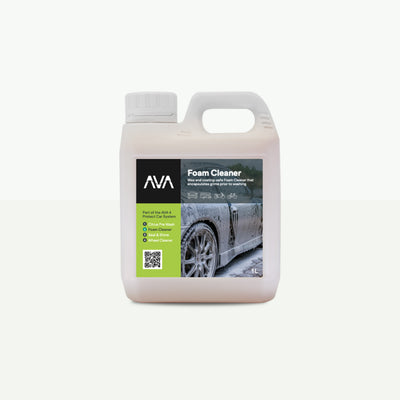 A 1 litre white plastic jug with handle and white screw cap, labelled ‘AVA Foam Cleaner’ with a green and black design panel. The front label shows a black car covered in thick foam.