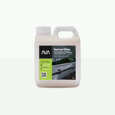 A 1 litre white plastic jug with handle and white screw cap, labelled ‘AVA Seal and Shine’ with a green and black design panel. The front label also shows a close-up of shiny car side panel and door handle.